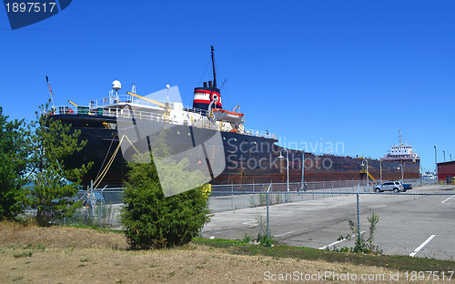 Image of Large freighter in harbour.