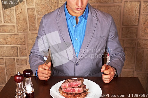 Image of eat a beef steak