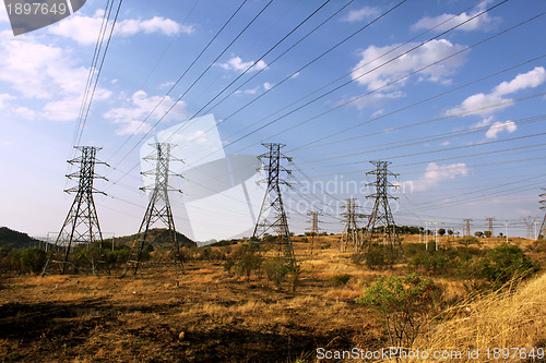 Image of Large Power Cable Towers in Rural Area
