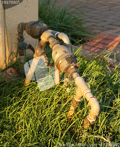 Image of Municipal Water Meter on Sidewalk 