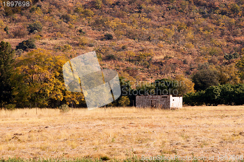 Image of Abandoned Shack Against Majestic Mountain  