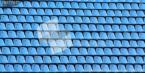 Image of Empty Blue Stadium Chairs