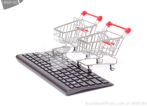 Image of Computer keyboard with shopping carts