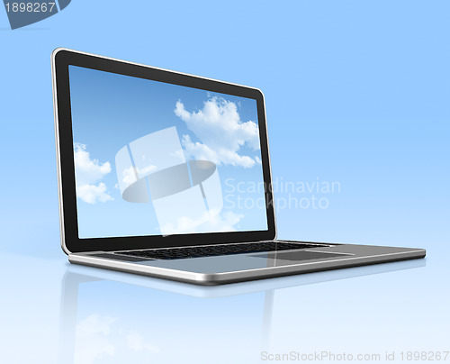 Image of Laptop computer with sky screen isolated on blue
