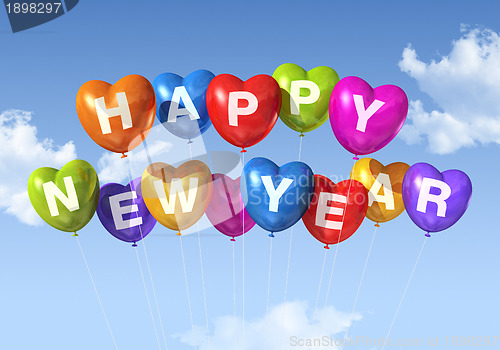 Image of happy new year heart shaped balloons