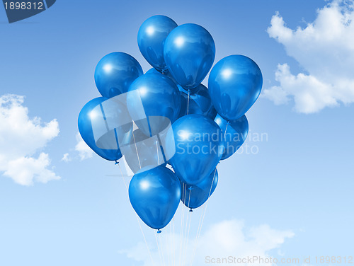 Image of blue balloons on a blue sky