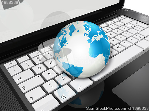 Image of World globe on a laptop computer