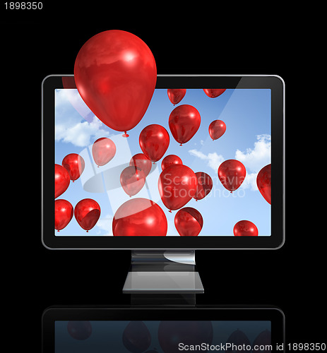 Image of red balloons in a 3D tv screen