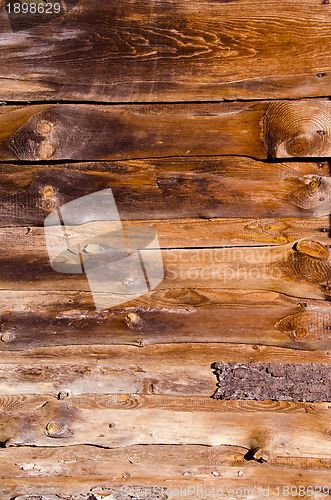 Image of Old abandoned rural house walls made of boards