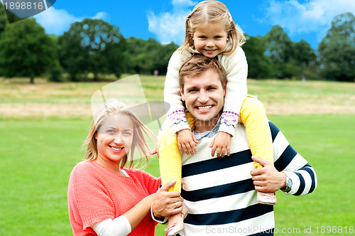 Image of Fun loving family enjoying spring day outdoors