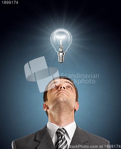 Image of Businessman Looking Upwards