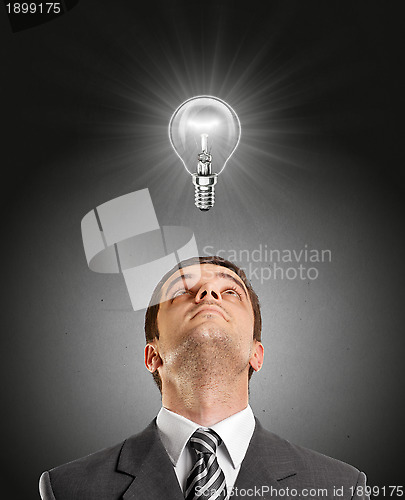 Image of Businessman Looking Upwards