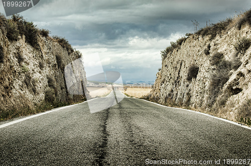 Image of Old dramatic asphalt road