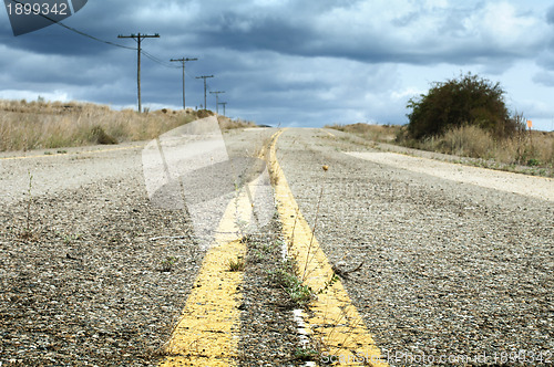 Image of Old dramatic asphalt road