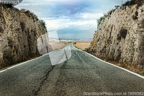 Image of Old dramatic asphalt road