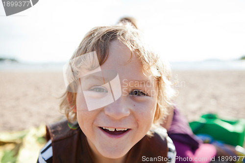 Image of Boy and mother and the beach.