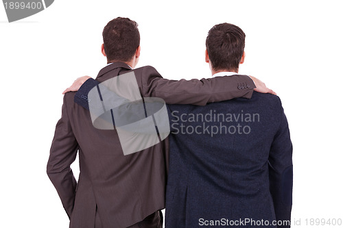 Image of rear view of two young business men friends