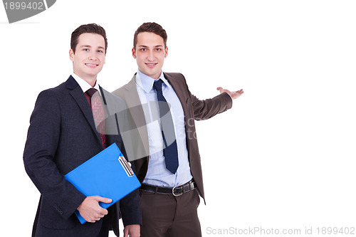 Image of two young businessmen presenting