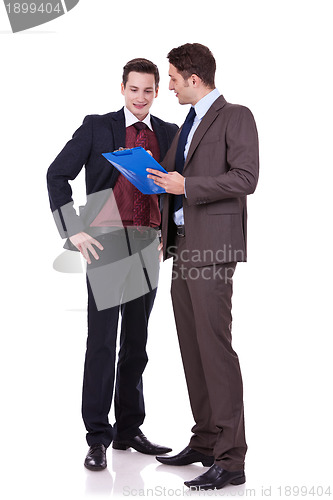 Image of young men discussing