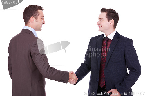 Image of two young businessman handshake