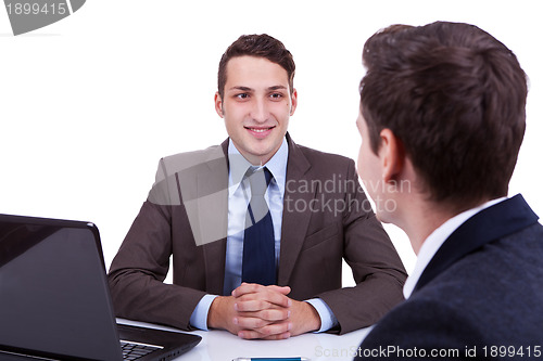 Image of business man listening to his employee