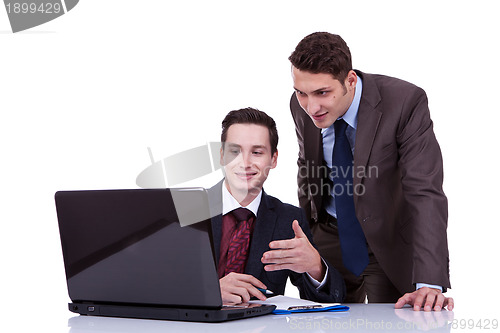 Image of businessmen sharing ideas 