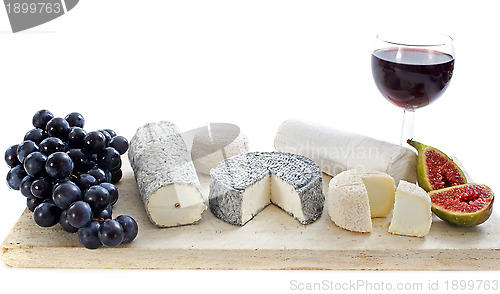 Image of goat cheeses and fruits