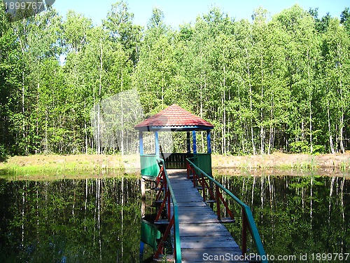 Image of summerhouse in picturesque place with river