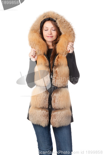 Image of Beautiful woman in fur trimmed jacket