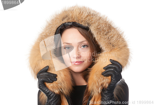 Image of Beautiful woman in fur trimmed jacket