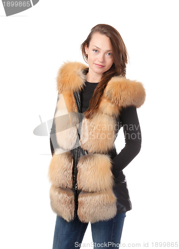 Image of Stylish woman in winter fur jacket