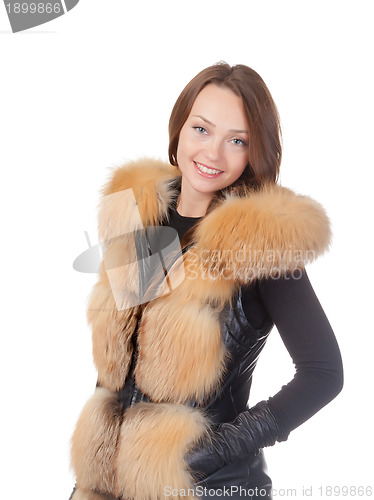 Image of Stylish woman in winter fur jacket