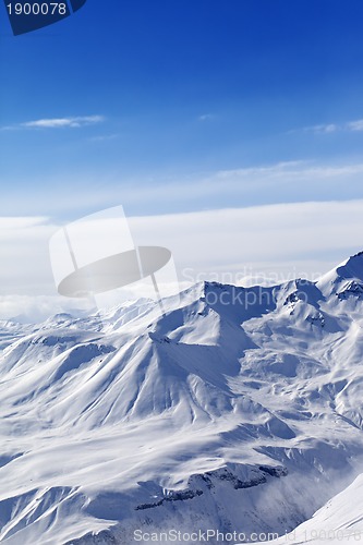 Image of Snowy mountains in sunny day