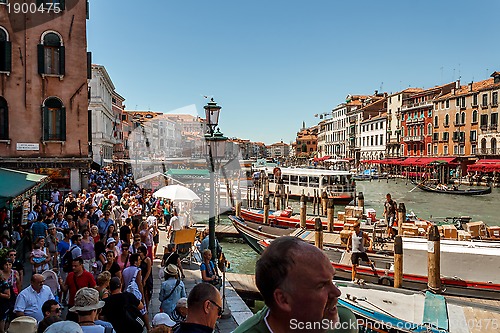 Image of 16. Jul 2012 - Large crowds of peoples under the bridge Rialto Bridge in Venice, Italy