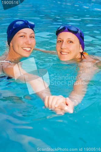 Image of two girl swimmers in the pool