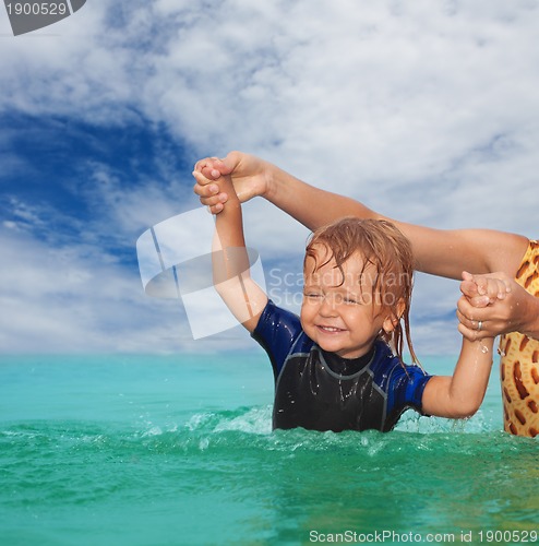 Image of Kid swimming exercises