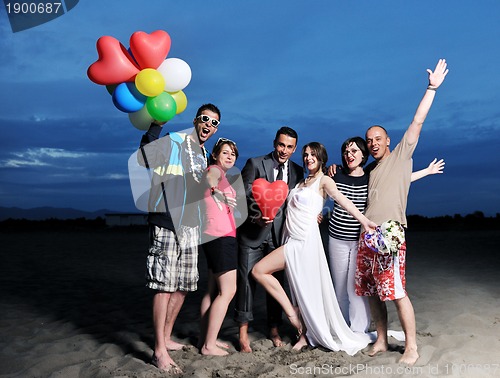 Image of happy young  people group have fun on beach