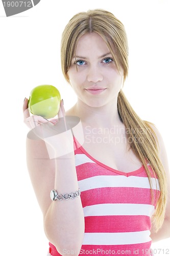 Image of happy  young  woman eat green apple isolated  on white