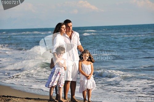 Image of happy young  family have fun on beach