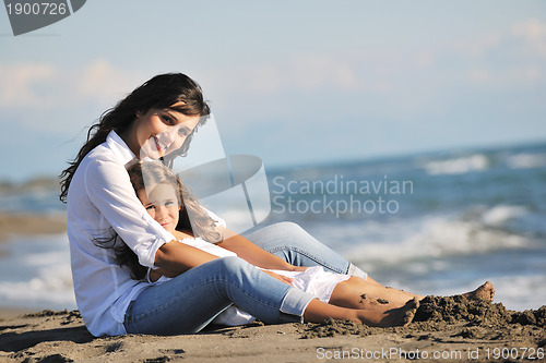 Image of mom and daughter portrait on beach