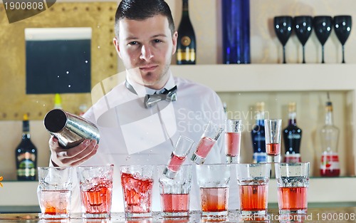 Image of pro barman prepare coctail drink on party