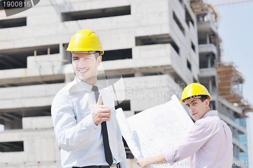 Image of Team of architects on construciton site