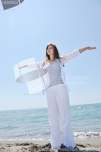 Image of young woman relax  on beach