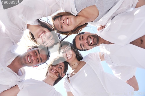 Image of happy young  people group have fun on beach