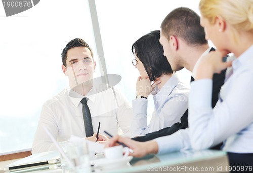 Image of group of business people at meeting