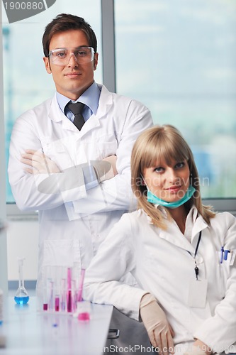 Image of science people in bright lab