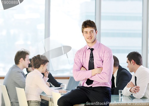 Image of group of business people at meeting