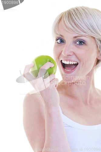 Image of happy  young  woman eat green apple isolated  on white