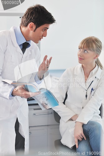 Image of science people in bright lab