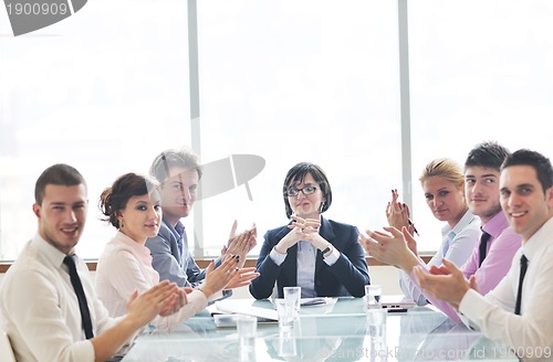 Image of group of business people at meeting